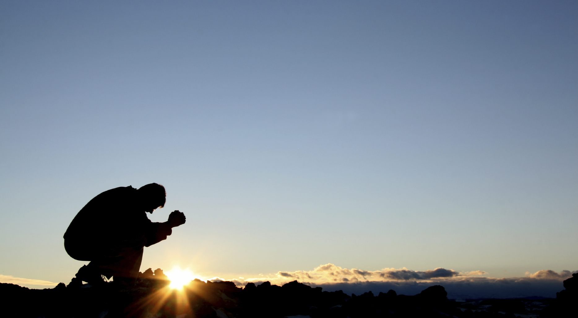 kneeling in prayer