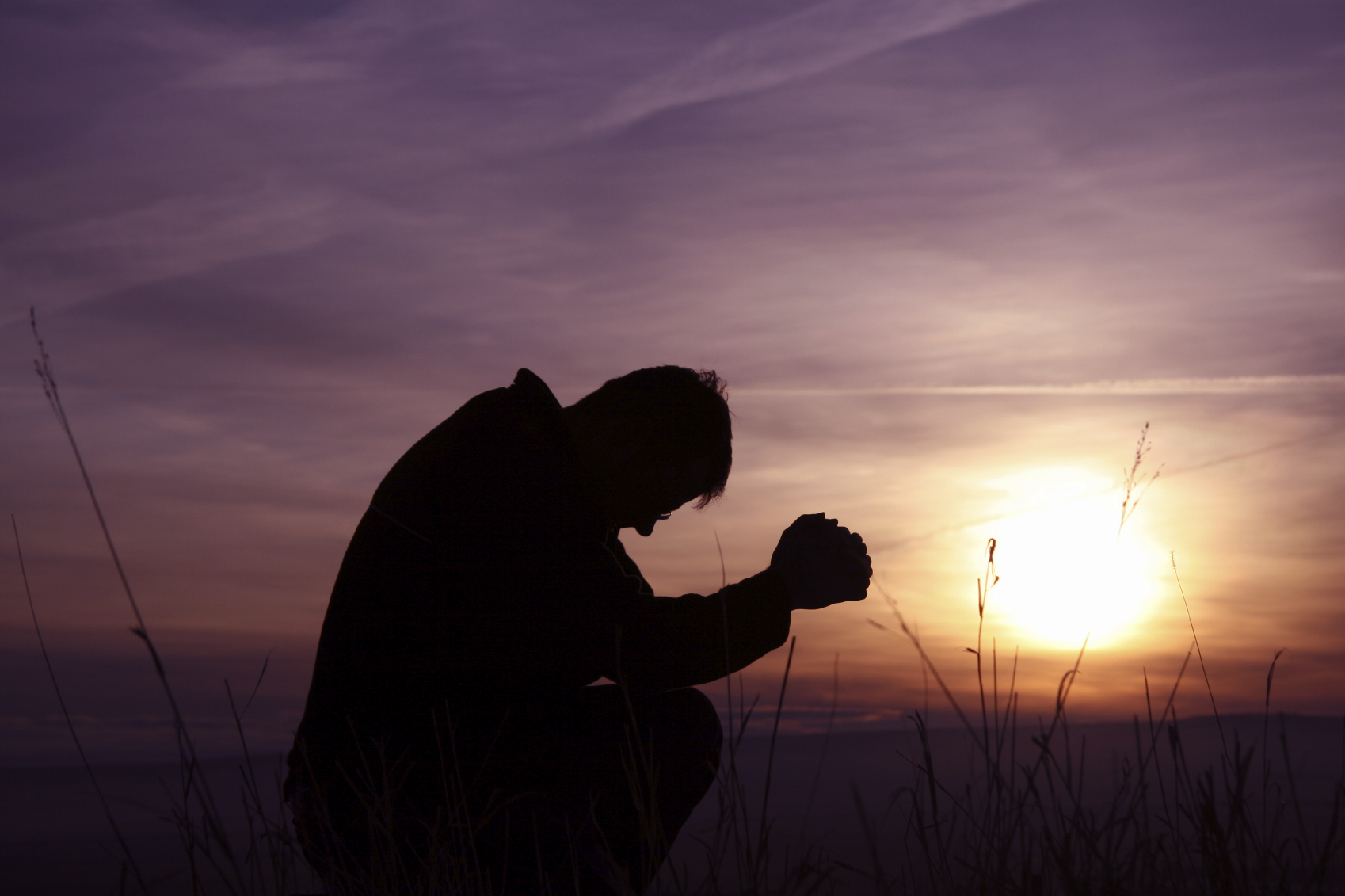 Kneeling in Prayer